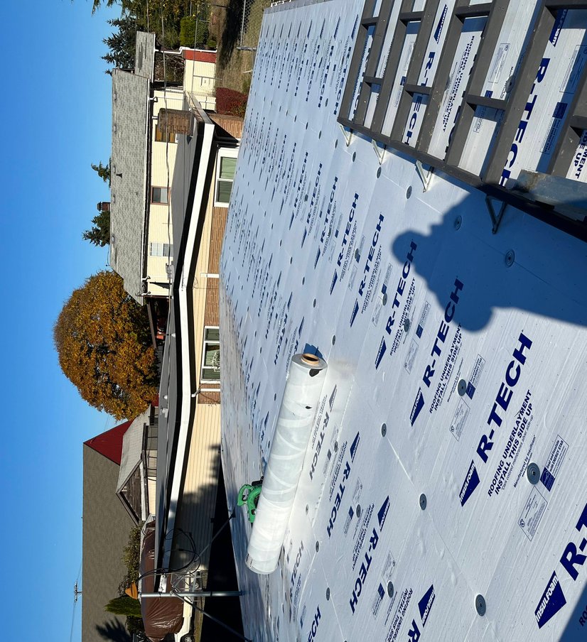 Roofing materials staged for installation